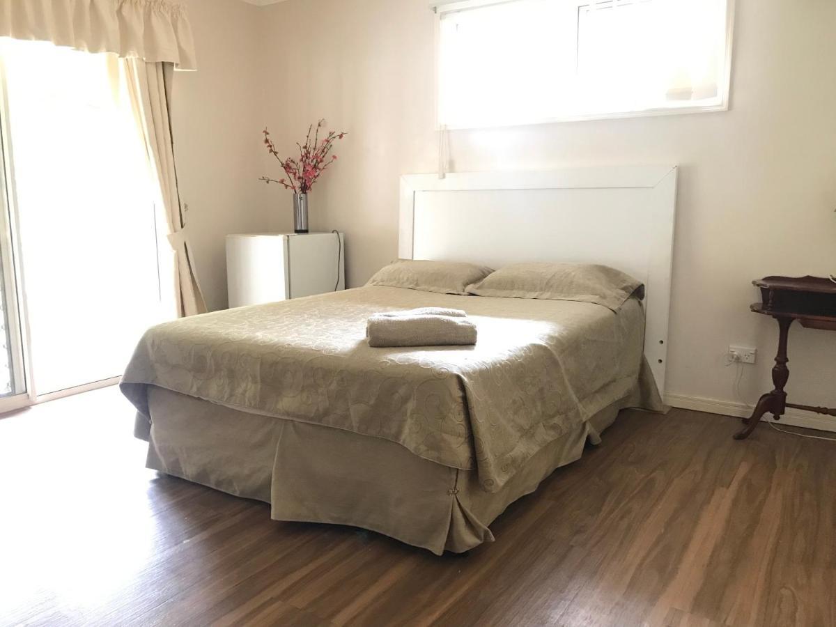 Theme Parks Amituofo Homestay Gold Coast Eksteriør billede