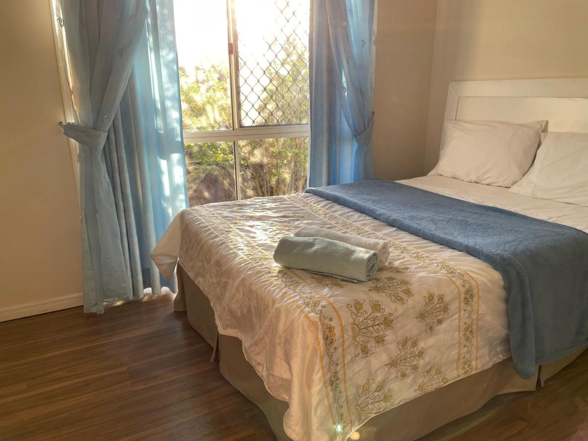 Theme Parks Amituofo Homestay Gold Coast Eksteriør billede