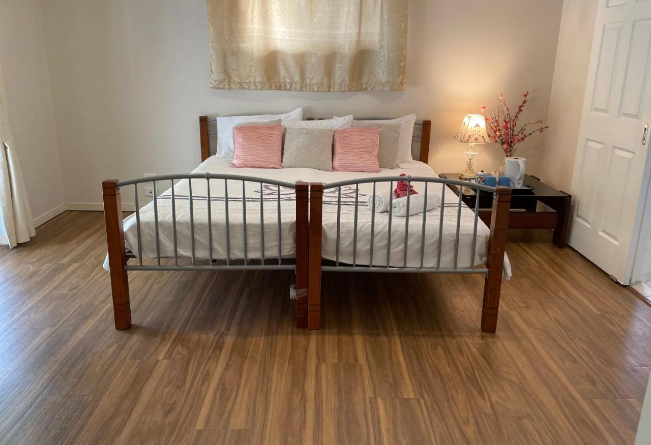 Theme Parks Amituofo Homestay Gold Coast Eksteriør billede
