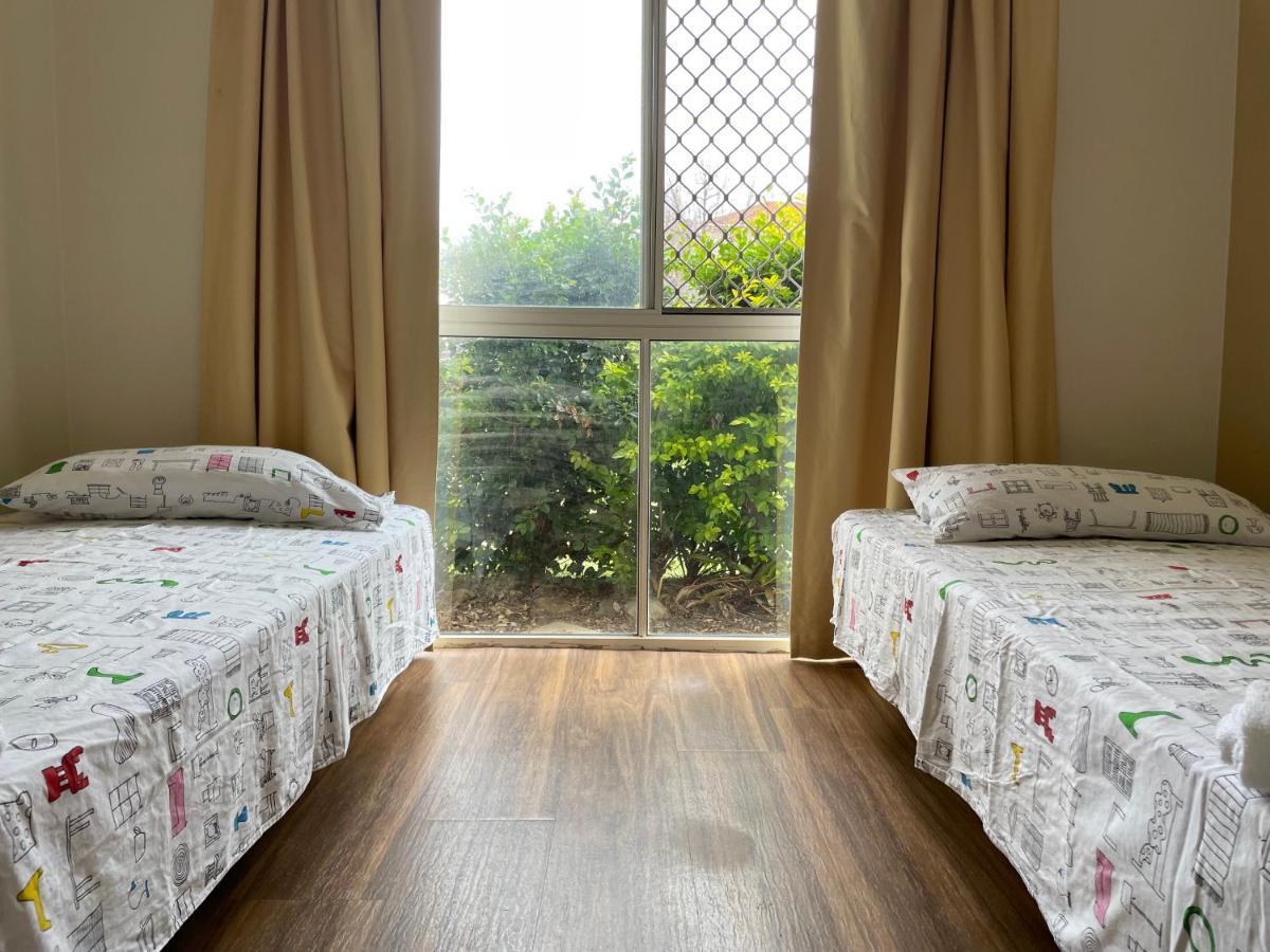 Theme Parks Amituofo Homestay Gold Coast Eksteriør billede