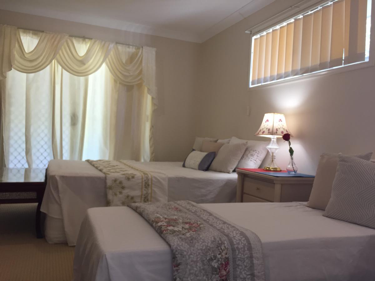 Theme Parks Amituofo Homestay Gold Coast Værelse billede